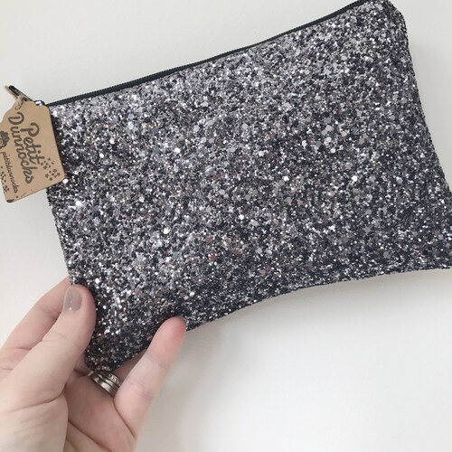 dark grey glitter clutch bag