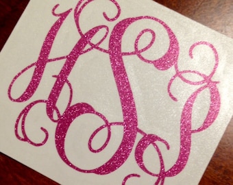 May include: Pink glitter monogram decal with the letters H, S, and G in a cursive font.