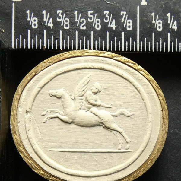 Antique grand tour circa 1820 plaster intaglio cameo 143 by Paoletti shows Cupid riding Pegasus