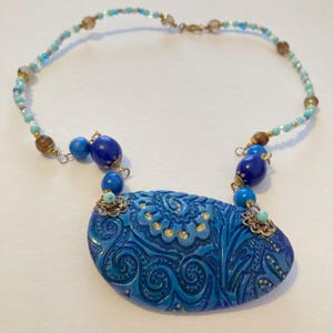 Handmade Blue Polymer Clay Pendant Necklace with Beads  Bohemian Statement Jewelry