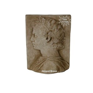 May include: A sculpted wall plaque featuring a profile of a person wearing a crown. The plaque is made of a light brown material and has a textured surface. The text "Almond Brown" is printed below the plaque.