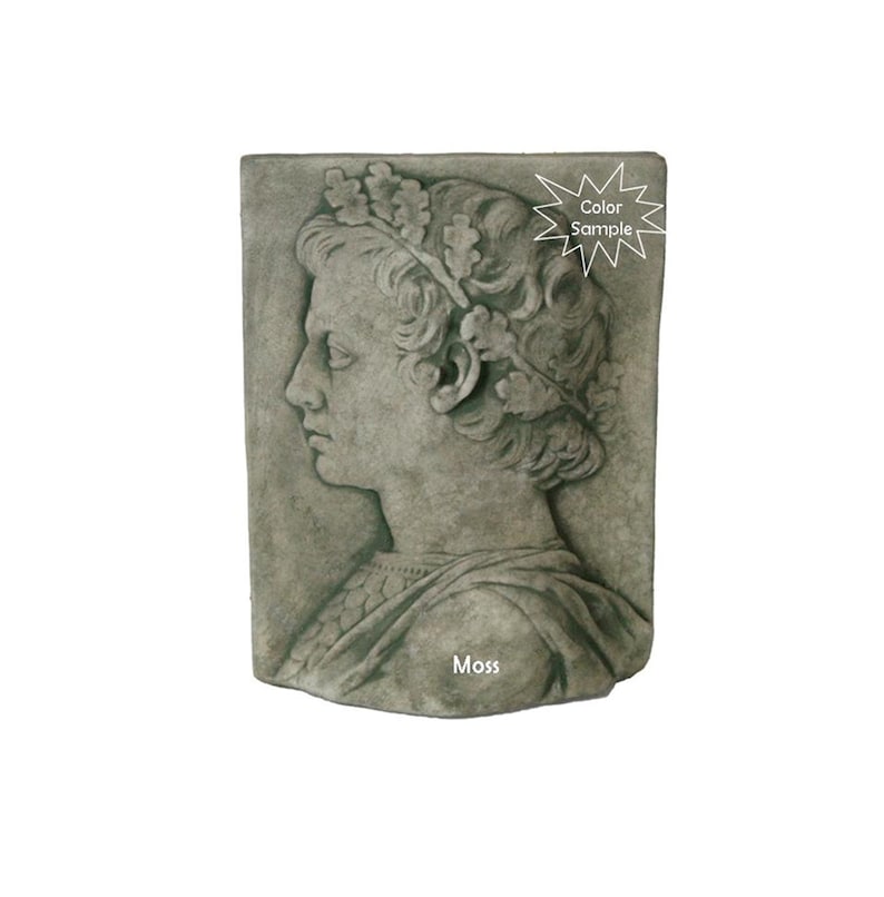 May include: A gray stone wall plaque with a sculpted profile of a person wearing a crown of leaves. The plaque has the word "Moss" written on the bottom.
