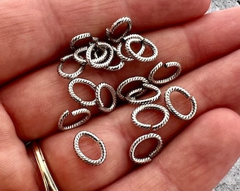 Anneaux sauteurs ovales en argent vieilli 6 x 8 mm, Laiton texturé, 20 anneaux, PW-6393