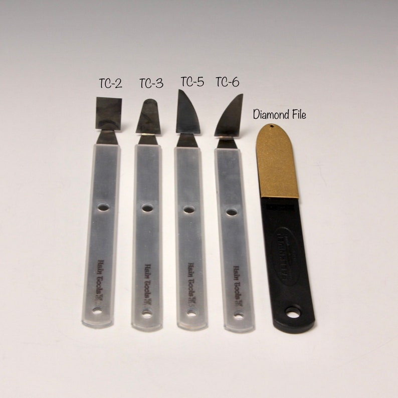 a diamond file~The Hardest TrimmingChatteringCurving Tools by Hsin-Chuen Lin A Set of 4 Tungsten Carbide \u00a9copy right #TXu 1-961-453