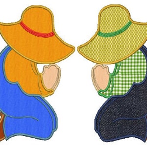 May include: Two figures kneeling with their hands clasped in prayer. The figure on the left is wearing a blue overall, an orange hat, and a red ribbon. The figure on the right is wearing a green and white checked shirt, a blue overall, and a yellow hat with a green ribbon.
