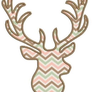 May include: A brown and pink chevron patterned deer head silhouette with antlers.