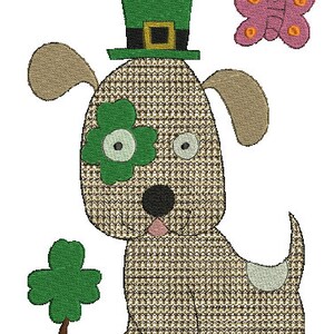 May include: A brown and white dog wearing a green leprechaun hat with a gold buckle. The dog has a green shamrock over one eye. A pink butterfly with orange accents is in the top right corner of the image. A green shamrock is in the bottom left corner of the image.