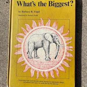 May include: A yellow book cover with the title "What's the Biggest?" by Barbara R. Fogel. The cover features an illustration of an elephant in a red sun.