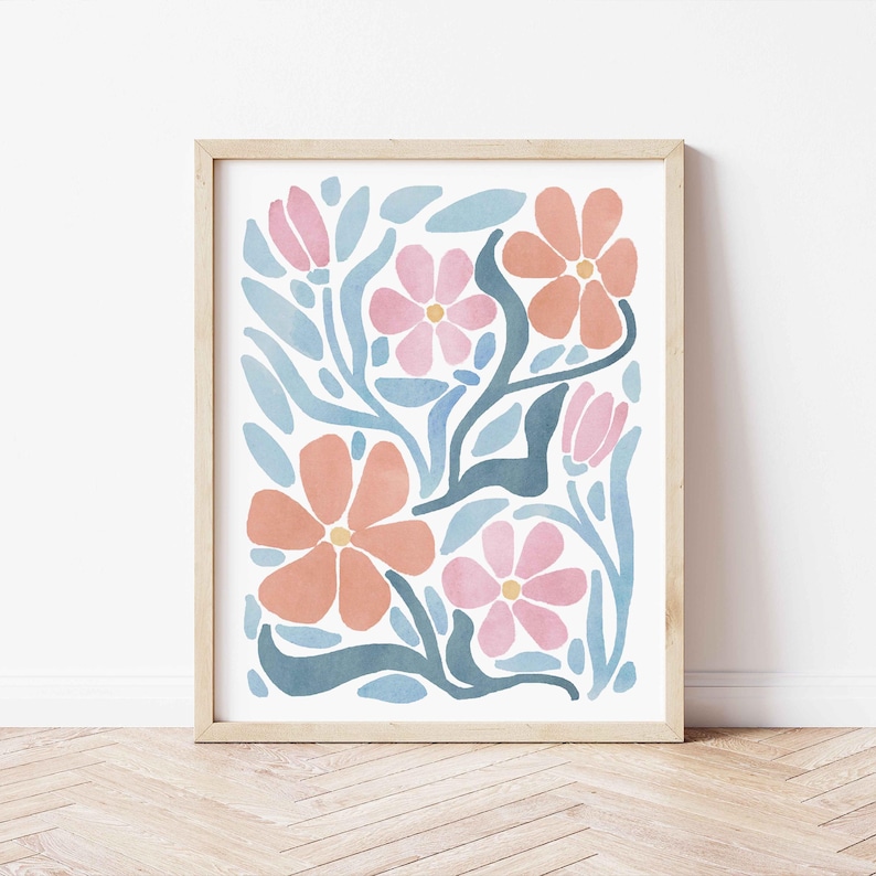 May include: A framed print featuring a floral design with pink and orange flowers on a blue background.