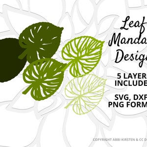 K&ouml;nnte beinhalten: Ein digitales Design eines Blatt-Mandala mit f&uuml;nf Schichten. Das Design ist in Gr&uuml;n und Wei&szlig; und enth&auml;lt den Text "Leaf Mandala Design", "5 Layers Included", "SVG, DXF & PNG Formats" und "Copyright Abbi Kirsten & CC Designs".