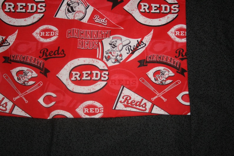 Cincinati Reds lap throw with flannel backing