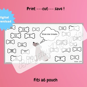 May include: A printable black and white activity sheet featuring a dog with a thought bubble that says "Give me treats". The sheet is filled with dog bone shapes, each with a number inside. The total of all the numbers is 275. The text "Print - cut - save!" is at the top of the sheet. The text "Fits a6 pouch" is at the bottom of the sheet.