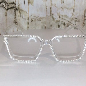 Wide frame reading glasses with the stunning Swarovski like crystals.