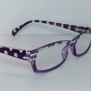 Purple and lavender reading glasses.