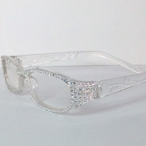 Beautiful clear rhinestone crystal glasses.   These glasses are very rich looking! Readnbling