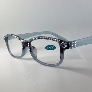 Genuine European Crystals on these beautiful baby blue and black reading glasses.