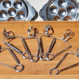 Vintage Japan stainless snail tongs / seafood utensils
