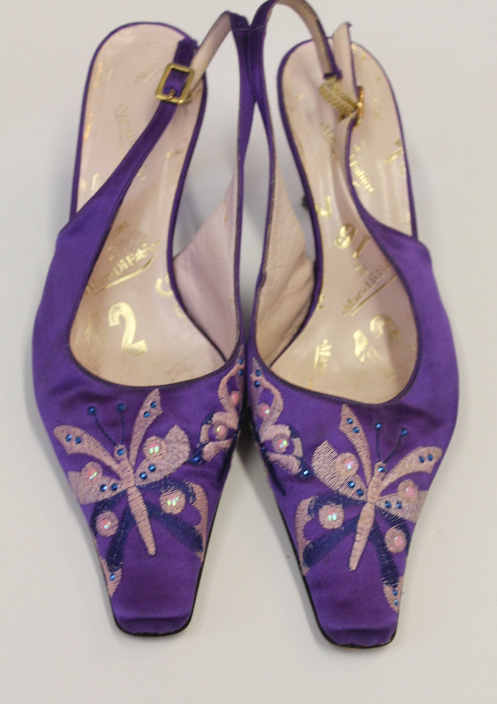 purple heels with butterflies