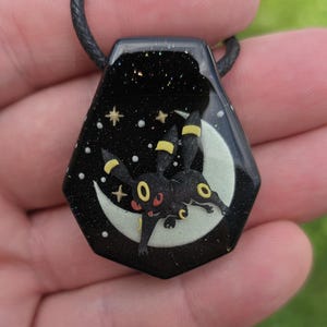 RTS - Collar con colgante de vidrio Umbreon que brilla en la oscuridad