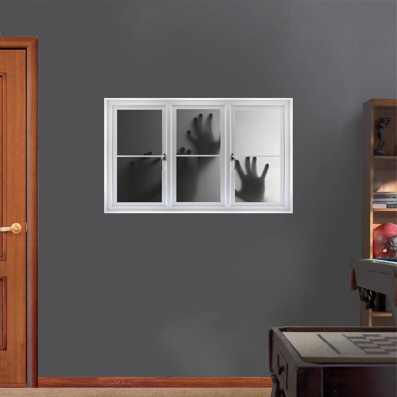 May include: A white window frame with three panes of glass. The glass is frosted and shows the silhouette of hands reaching through the glass.