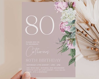 May include: A blush pink invitation card with a floral design featuring white and pink flowers. The text on the card reads "80", "Please join us to celebrate Catherine's 80th Birthday", "Saturday 27th August | 3PM - 6PM", "Cru Wine Bar - Kitchen, Kew Melbourne", "RSVP to Ally by 20th August | 0422 556 875", "...It's a surprise!"