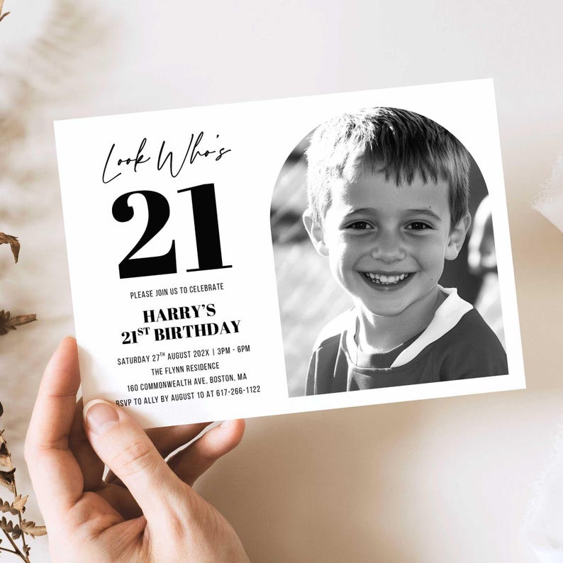 Hand holding the printed 21st birthday invitation against a neutral background, showing size, layout, and overall design clarity.