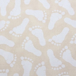 Moda Muslin Mates with baby feet  Sold by 1/2 yard , but if more than one is ordered will be cut in one continuous piece