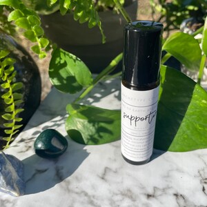 O APOIADOR • Arquétipo • Boost • Rolo de Óleo Essencial • Aromaterapia • Suporte Imunológico