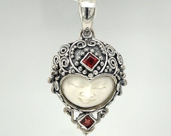 Red Garnet Necklace, Carved Bone Face, Princess Cut Garnets, Sterling Silver Bali Style Pendant, Black Cord