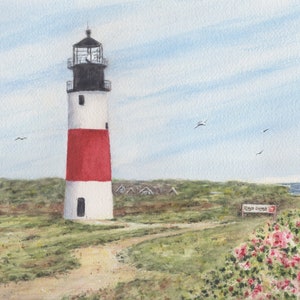May include: Watercolor painting of a lighthouse with a red and white striped tower, topped with a black lantern room. The scene includes a path, green grass, pink flowers, and a sign that reads "Coast Guard".