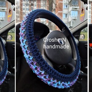 May include: Crochet steering wheel cover in blue and purple with the text "CroshetN handmade".