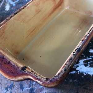 Hand Glazed Stoneware Loaf Pan: Rustic Red Cabin Design