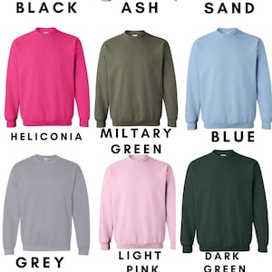 May include: A selection of blank crewneck sweatshirts in various colors, including black, ash, sand, heliconia, military green, blue, grey, light pink, dark green, and white. The image also includes a logo for Sunflower Thread.
