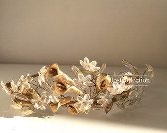 Gold bridal tiara, gold handmade Cala lilies with clear flowers & beads to create a floral bridal headpiece, for a bride on her wedding day.