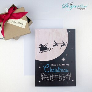 Weihnachtskarte - Weihnachtsmann Schlitten Rentier Mond Schnee Weihnachtsmann