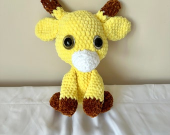 Hand crocheted giraffe plush toy