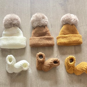 Faux fur pompom hat and baby slippers set image 1