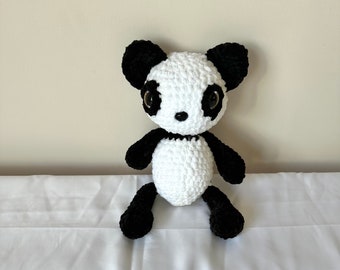 Hand crocheted panda plush
