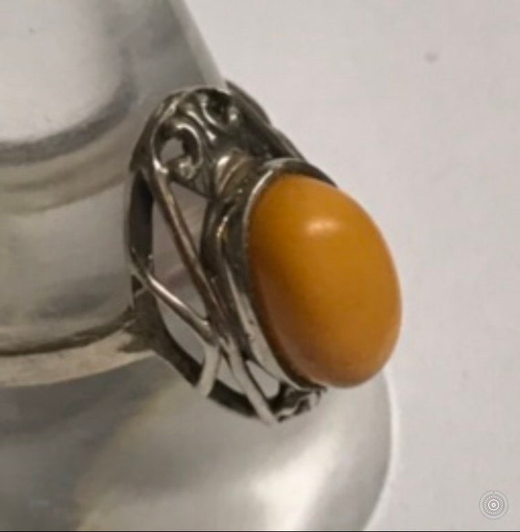 hallmarked 925 silver ring with genuine Royal amber hand carved stone