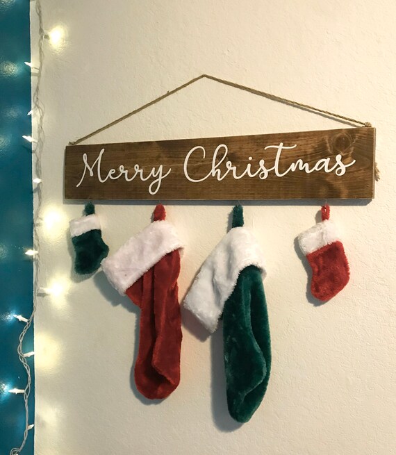 Items similar to Merry Christmas Stocking holder, Stocking Hanger, And