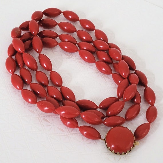 Vintage long red plastic beaded necklace in 70s s… - image 2
