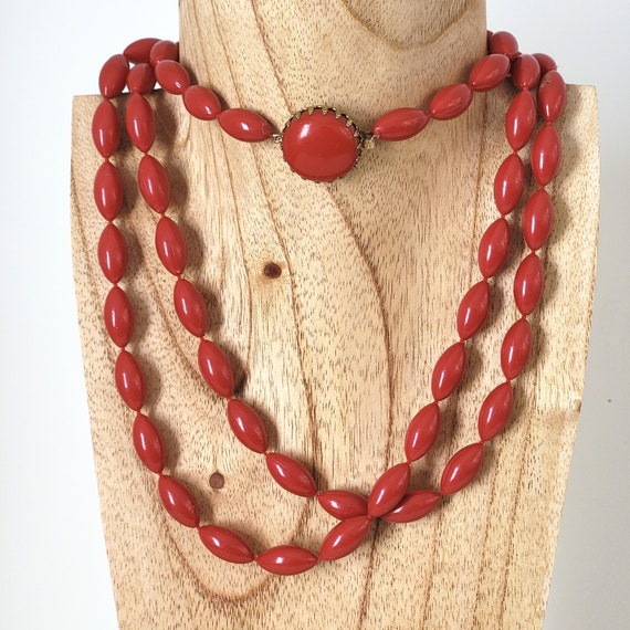 Vintage long red plastic beaded necklace in 70s s… - image 1