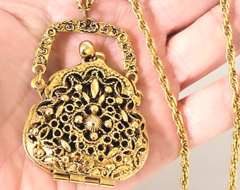 Vintage purse pendant necklace signed ART in antique gold tone filigree on a 24" long rope chain