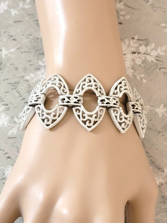 Crown Trifari white enamel filigree panel bracelet, w… Gem