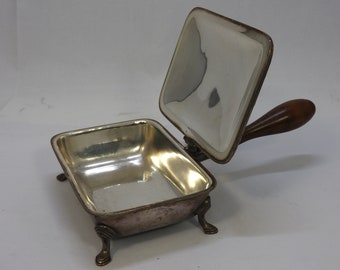 Rare item- a silent butler, crumb catcher,  silver plated on four feet