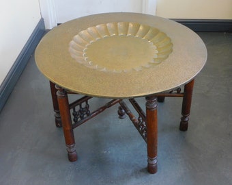 Antique eastern round brass engraved top  tea/coffee table with folding wooden turned base, with Six legs