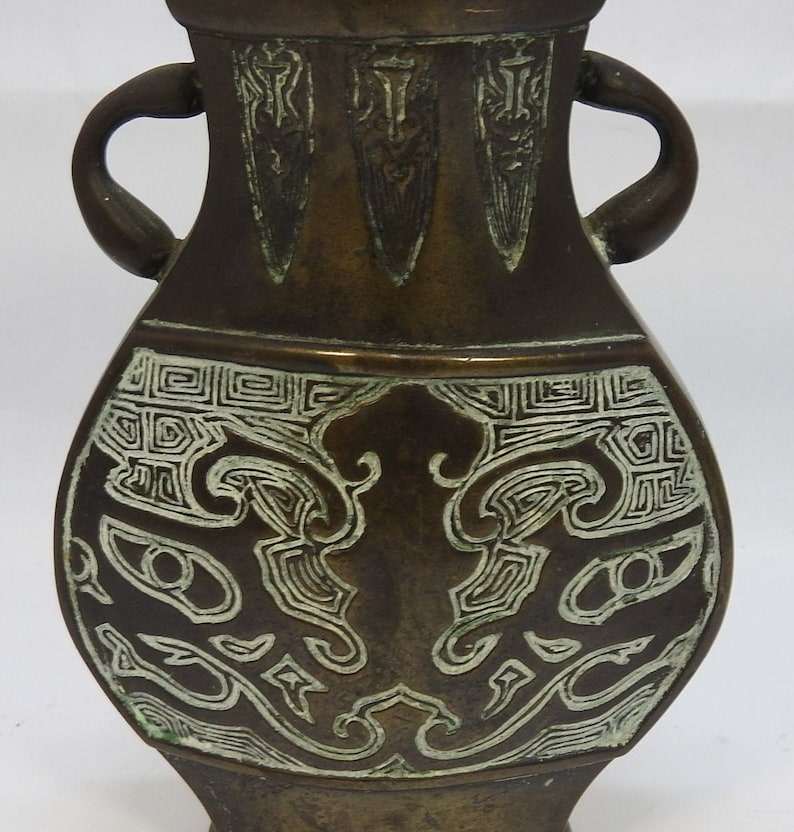 Bronze vase with twin handles