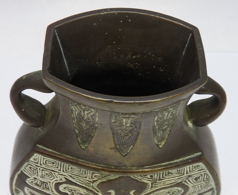 Bronze vase with twin handles