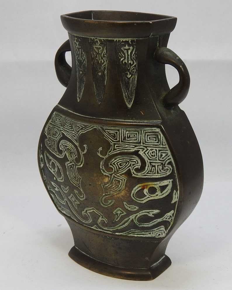 Bronze vase with twin handles