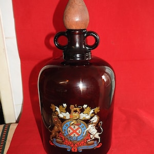 Rare antique/ vintage brown glass  Demijohn with wooden stopper